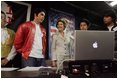 Laura Bush talks with members of the Shakespeare Festival/LA's Will Power to Youth program before watching their rendition of "Romeo and Juliet" in Los Angeles April 26, 2005.