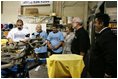 Laura Bush watches a silkscreen demonstration during a tour of Homeboy Industries in Los Angeles April 27, 2005.