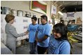 Laura Bush meets members of the Homeboy Industries program in Los Angeles during her tour of the facility April 27, 2005.