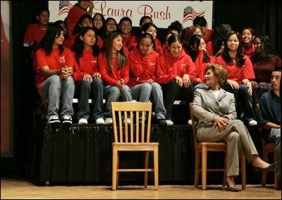 Laura Bush talks with middle school students on stage prior to delivering remarks at Sun Valley Middle School in Sun Valley, Calif., April 27, 2005.