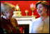 Laura Bush shares a light moment with Ludmila Putina, wife of Russian Federation President Vladimir Putin, in the Red Room of the White House the Saturday, October 12, 2002 prior to the opening ceremony of the Second Annual National Book Festival. White House photo by Susan Sterner.