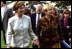 Laura Bush and Ludmila Putina, wife of Russian Federation President Vladimir Putin, stroll across the lawn of the Capitol visiting the tents of authors and story tellers at the Second Annual National Book Festival Saturday, October 12, 2002. White House photo by Susan Sterner.