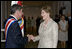 After the inauguration ceremony, Mrs. Laura Bush greets President Oscar in San Jose, Costa Rica, Monday, May 8, 2006. "Today I had the opportunity to convey to President Arias the United States' strong support and partnership with Costa Rica," said Mrs. Bush in a statement to the press. "We have a history of a long friendship, and I'm very, very happy to have been the one to get to give him the very best wishes of the American people."