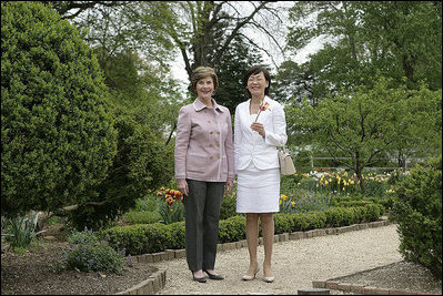 Mrs. Laura Bush and Mrs. Akie Abe, wife of Japanese Prime Minister Shinzo Abe, tour the gardens at the Mount Vernon Estate of George Washington Thursday, April 26, 2007, in Mount Vernon, Va.