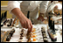 White House Executive Pastry Chef William Yosses shows off some of the unique items he created for the 2008 Cooper-Hewitt National Design Awards on July 14, 2008 at the White House.