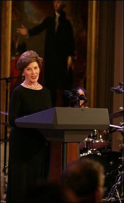 Mrs. Laura Bush welcomes guests to the East Room for entertainment Thursday night, Sept. 14, 2006, during the Thelonious Monk Institute of Jazz dinner at the White House. White House photo by Shealah Craighead 