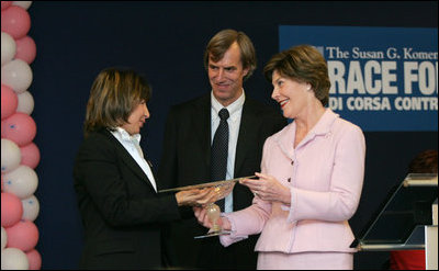 Mrs. Laura Bush presents the first Komen Italia Award, Thursday, Feb. 9, 2006 to Mrs. Marisa Giannini, a cancer survivor and the director of the Philatelic division of the Italian Postal Service, for her volunteer services with Koman Italia of The Susan G. Komen Breast Cancer Foundation. White House photo by Shealah Craighead 