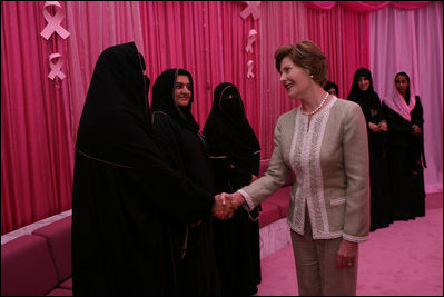 Mrs. Laura Bush meets one-on-one with women in the Pink Majlis Monday, Oct. 22, 2007, at the Sheikh Khalifa Medical Center in Abu Dhabi, United Arab Emirates. The Majlis is a tradition of open forum for a wide range of topics. The Majlis focuses issues related to breast cancer. 