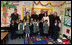 Mrs. Laura Bush accompanied by Archbishop of Washington, D.C. Donald W. Wuerl, pose for a photo with staff and students of Holy Redeemer School Wednesday, Jan. 30, 2008, in Washington, D.C. 