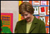 Mrs. Laura Bush listens to a kindergarten student during her visit at Holy Redeemer School Wednesday, Jan. 30, 2008. 