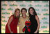 Mrs. Laura Bush is joined by her daughters Jenna Bush, left, and Barbara Bush, as they pose for a photo with Sesame Street character Elmo Wednesday evening, May 30, 2007, at the Sesame Workshop Fifth Annual Benefit Dinner in New York, where Mrs. Bush was honored for her commitment to literacy and education.