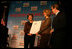 Mrs. Laura Bush presents fifth grade history teacher Maureen Festi, center, who teaches at Stafford Elementary School in Stafford, Conn., with the 2007 Preserve America National History Teacher of the Year Award at the Museum of the City of New York, Friday, Nov. 16, 2007 in New York. Dr. James Basker, president of the Gilder Lehrman Institute for American History looks on.