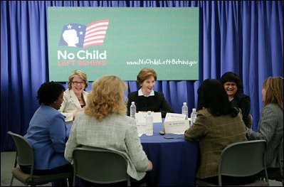 Mrs. Laura Bush is joined by U.S. Department of Education Secretary Margaret Spellings at a roundtable discussion with Ohio teachers during "Celebrating Teachers" week, Tuesday, May 2, 2006 at the Thurber Center in Columbus, Ohio, highlighting the importance of teachers in children's lives. Moderator of the discussion is Deepa Ganschinietz, far right, the 2006 Ohio Teacher of the Year.