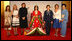 Spouses of G8 leaders pose with a model dressed in a Junihitoe, a 12-layered ancient kimono, following a demonstration of how this look is achieved, which was part of a traditional Japanese culture presentation on Monday, July 7, 2008, in Toyako, Japan. From left, the spouses are Mrs. Margarida Uva Barroso, wife of the President of the European Commission; Mrs. Laureen Harper, wife of the Prime Minister of Canada; Mrs. Sarah Brown, wife of the Prime Minister of the United Kingdom; Mrs. Laura Bush, Mrs. Svetlana Medvedeva, wife of the President of Russia; and Mrs. Kiyoko Fukuda, wife of the Prime Minister of Japan. The demonstration was presented at the Windsor Hotel Toya Resort and Spa's Bridal Salon in Toyako, Japan and the event celebrated the 1000th anniversary of the Tale of Genji, a Japanese classic written by Lady Murasaki. Junihitoe is an example of the formal court dress worn by women during Murasaki's time.