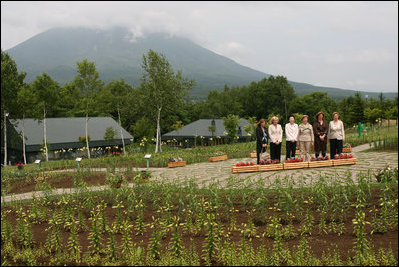 Mrs. Laura Bush and spouses of G8 leaders pause for a photo Tuesday, July 8, 2008, during their visit to the village of Makkari on the northern Japanese island of Hokkaido. From left are: Mrs. Margarida Uva Barosso, wife of the President of the European Commission; Mrs. Laureen Harper, wife of the Prime Minister of Canada; Mrs. Kiyoko Fukuda, wife of the Prime Minister of Japan; Mrs. Laura Bush; Mrs. Sarah Brown, wife of the Prime Minister of the United Kingdom; and Mrs. Svetlana Medvedeva, wife of the President of Russia.