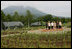 Mrs. Laura Bush and spouses of G8 leaders pause for a photo Tuesday, July 8, 2008, during their visit to the village of Makkari on the northern Japanese island of Hokkaido. From left are: Mrs. Margarida Uva Barosso, wife of the President of the European Commission; Mrs. Laureen Harper, wife of the Prime Minister of Canada; Mrs. Kiyoko Fukuda, wife of the Prime Minister of Japan; Mrs. Laura Bush; Mrs. Sarah Brown, wife of the Prime Minister of the United Kingdom; and Mrs. Svetlana Medvedeva, wife of the President of Russia.