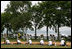 Mrs. Laura Bush, joined by other G8 Summit spouses, plants a tree at the Toyako New Mount Showa Memorial Park during a ceremony Wednesday, July 9, 2008, in Hokkaido, Japan. Joining Mrs. Bush, left, at the planting ceremony are, from left: Mrs. Sarah Brown, wife of the Prime Minister of the United Kingdom, Mrs. Svetlana Medvedeva, wife of the President of Russia, Mrs. Laureen Harper, wife of the Prime Minister of Canada, Mrs. Kiyoko Fukuda, wife of the Prime Minister of Japan, and Ms. Harumi Takahashi, Governor of Hokkaido.