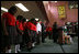 President George W. Bush and Mrs. Laura Bush join students and facility at the Dr. Martin Luther King Jr. Charter School for Science and Technology in a moment of silence marking the second anniversary of Hurricane Katrina, Wednesday, Aug. 29, 2007, in New Orleans.