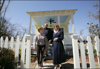 Mrs. Laura Bush talks with Mayor Connie Moran during a tour of Katrina Cottages, Thursday, Feb. 22, 2007 in Ocean Springs, Miss., the quaint, colorful and quickly built cottages for post-Katrina living. White House photo by Shealah Craighead 