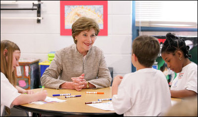 Mrs. Laura Bush participates in a discussion with children in a Boys & Girls Club program Thursday, Feb. 22, 2007 at the D’Iberville Elementary School in D’Iberville, Miss. White House photo by Shealah Craighead 