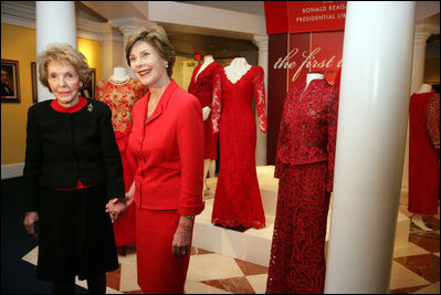 Mrs. Laura Bush and Mrs. Nancy Reagan pose for a photo during a tour of the Red Dress Exhibit at the Ronald Reagan Presidential Library and Museum Wednesday, Feb. 28, 2007, in Simi Valley, Calif. The exhibit features red dresses and suits worn by America’s First Ladies who have joined the Heart Truth campaign to raise awareness of heart disease as the 