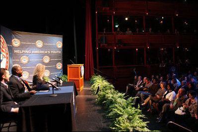 Mrs. Laura Bush listens to a panel discussion, flanked by NBA player Greg Oden, left, and student, Shantel Monk, Thursday, Feb. 28, 2008, at the regional conference on Helping America's Youth at the Portland Center for the Performing Arts in Portland, Ore. Also joining Mrs. Bush, at right, are Oregon Governor Theodore (Ted) Kulongoski and his, wife, Mrs. Mary Oberst.