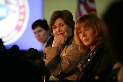 Mrs. Laura Bush listens to panel members during her participation is a roundtable discussion on the special needs of military youth and families Wednesday, Dec. 5, 2007, at the Learning Center at Andrews Air Force Base in Maryland.