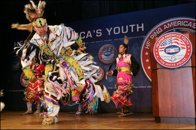 Members of the Three Affiliated Tribes Youth Dance Troupe perform at the Helping America's Youth Fourth Regional Conference in St. Paul, Minn., Friday, August 3, 2007. The dancers, ranging in age from 10 to eighteen, showcased six styles of Plains Powwow Dancing. Each style of dance represents a specific history and tells a story of American Indian culture. A segment of the conference addressed the unique challenges facing tribal youth.