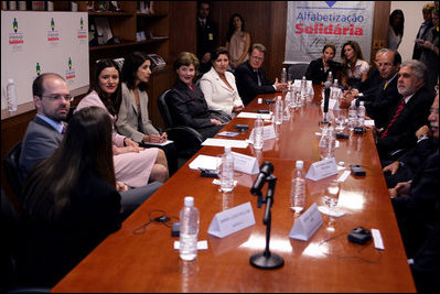 Mrs. Laura Bush participates in a discussion at the AlfaSol literacy program Friday, March 9, 2007, in Sao Paulo, Brazil. Students who complete the literacy program are eligible to enter Brazil’s Youth and Adult Education (YAE) national program, which offers skills training for specific employment opportunities. White House photo by Shealah Craighead