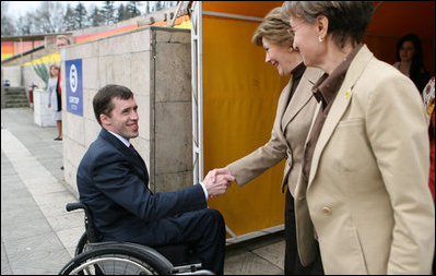 Mrs. Laura Bush is welcomed by Mr. Mikhail Terentyev, Secretary General of the Russian Paralympic Committee, to Central Sochi Stadium in Sochi Sunday, April 6, 2008. Mrs. Bush visited with the team before departing Sochi for Washington, D.C.