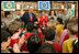 Mrs. Laura Bush and Interior Secretary Dirk Kempthorne swear in new Junior Rangers, students at Balboa Magnet Elementary School Wednesday, Feb. 28, 2007, in Northridge, Calif. The National Park Service Junior Ranger program provides activities in parks and partnering schools to teach young people about America's National Parks. White House photo by Shealah Craighead 