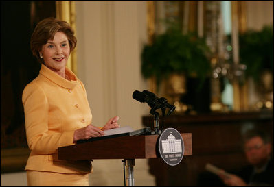 Mrs. Laura Bush welcomes guests to the East Room of the White House Monday, May 12, 2008, as she congratulates the recipients of the 2008 Preserve America Presidential Awards. The African Burial Ground Project, The Corinth and Alcorn County Mississippi Heritage Tourism Initiative, the Lower East Side Tenement Museum and the Texas Historic Courthouse Preservation Program were all honored for their efforts in preserving our national historic sites.