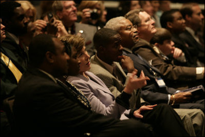 Mrs. Laura Bush speaks with youth presenter Kanesha Butler and fellow guests at the third regional conference on Helping America’s Youth at Tennessee State University, Thursday, April 12, 2007, in Nashville, Tenn. Mrs. Bush, who was the keynote speaker at the event, said, “Adults need to become aware of the challenges facing children, and take an active interest in their lives.”