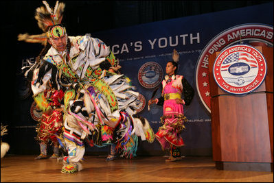 Members of the Three Affiliated Tribes Youth Dance Troupe perform at the Helping America's Youth Fourth Regional Conference in St. Paul, Minn., Friday, August 3, 2007. The dancers, ranging in age from 10 to eighteen, showcased six styles of Plains Powwow Dancing. Each style of dance represents a specific history and tells a story of American Indian culture. A segment of the conference addressed the unique challenges facing tribal youth.