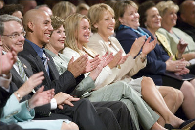 Mrs. Laura Bush, joined by, from left, Robert D. Coombe, Ph.D., Chancellor, University of Denver, Jordan Suniga, Student, Grace Keirnes, Student, and Lt. Governor Jane E. Norton, Lt. Governor of Colorado, attends the second regional Helping America's Youth Conference on Friday, August 4, 2006, in Denver, Colorado. According to the Department of Defense there are approximately 189, 000 children of deployed parents nationwide. White House photo by Shealah Craighead 