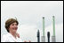 Mrs. Laura Bush, ship sponsor of the USS Texas, applauds at the conclusion of the Commissioning Ceremony Saturday, September 9, 2006, in Galveston, Texas. White House photo by Shealah Craighead 