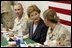 Laura Bush joins US troops as they dine in the Dragon Chow Dining Hall on Bagram Air Base in Kabul, Afghanistan Wednesday, March 30, 2005.