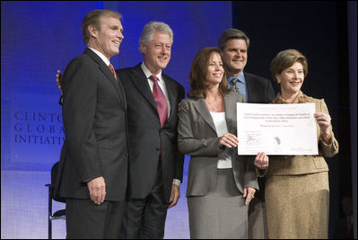 Mrs. Laura Bush announces a $60 million public-private partnership between the U.S. Government and the Case Foundation at President Bill Clinton's Annual Global Initiative Conference in New York Wednesday, September 20, 2006. With her, from left, are: Raymond Chambers, Chairman, MCJ and Amelier Foundations; former President Bill Clinton, and Jean Case and Steve Case, founders of the Case Foundation. The partnership will work to provide clean water by 2010 to up to 10 million people in sub-Sahara Africa, where a child dies every 15 seconds due to illnesses related to unsanitary drinking water. White House photo by Shealah Craighead 