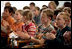 Children applaud after a speech by Mrs. Laura Bush at the ribbon cutting at the Opening of America @ Your Library at Schwerin City Library Wednesday, June 6, 2007 in Schwerin, Germany.