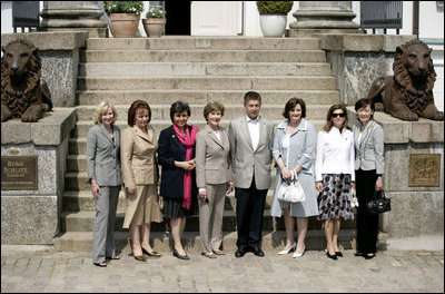 Partners of the G8 leaders pose outside Burg Schlitz Thursday, June 7, 2007, in Hohen Demzin, Germany. From left are: Mrs. Laureen Harper, Mrs. Lyudmila Putina, Mrs. Flavia Franzoni, Mrs. Laura Bush, Dr. Joachim Sauer, Mrs. Cherie Booth Blair, Mrs. Maria Margarida Pinto Ribeiro Sousan Uva Barroso and Mrs. Akie Abe.