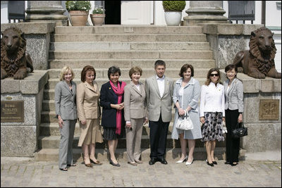 Mrs. Laura Bush joins the G8 spouses at Old Lumber Port in Wismar, Germany, as they meet for a group photo with Junior 8 Student Leaders.