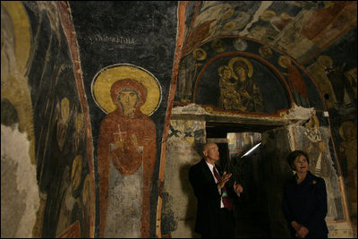 Mrs. Laura Bush listens to Mr. Belcho Belev, Senior Curator of the Boyana Church during a tour Monday, June 11, 2007, in Sofia, Bulgaria.