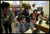 Mrs. Laura Bush joins youngsters at the opening of the American Children's Corner at Sofia City Library Monday, June 11, 2007, in Sofia. Mrs. Bush said, "The books in this American Corner tell the story of the United States, describing my country's history, culture and diverse society. In these books, children in Sofia can discover literature that children in the United States enjoy."