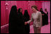 Mrs. Laura Bush meets one-on-one with women in the Pink Majlis Monday, Oct. 22, 2007, at the Sheikh Khalifa Medical Center in Abu Dhabi, United Arab Emirates. The Majlis is a tradition of open forum for a wide range of topics. The Majlis focuses issues related to breast cancer.