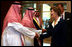 Mrs. Laura Bush is greeted by Mr. Bade Al-Romaih, Guest Relations Manager for the Conference Palace Hotel, upon her arrival for a private lunch Tuesday, Oct. 23, 2007, in Riyadh, Saudi Arabia.