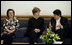 Mrs. Laura Bush speaks with Dr. Rasha al-Sabah, right, Under Secretary of the Ministry of Higher Education, during a Diwaniya held by political women leaders Wednesday, Oct. 24, 2007, in Kuwait City, Kuwait. Also pictured is the Minister of Education Dr. Nouriyah Al-Sabih.