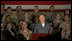 Mrs. Laura Bush addresses American troops Thursday, Oct. 25, 2007, at Ali Al Salem Air Base near Kuwait City. "With your courage and compassion, you show that the United States military is one of the greatest forces for good in the world," Mrs. Bush told the troops. "And I hope you know that we pray... for an end to the violence everywhere so that future generations can grow up in a world at peace -- a world that you shaped."