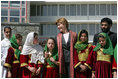 Mrs. Bush stands with a group of Afghan girls upon her arrival in Kabul, Afghanistan, Tuesday, March 29, 2005. 