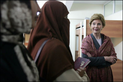 Laura Bush talks with female students in the newly built National Women’s Dormitory on the campus of Kabul University Wednesday, March 30, 2005, in Kabul, Afghanistan. The women’s dormitory was built to provide a safe place for young women to live while pursuing studies away from their families. 