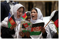 Students sing as they welcome Mrs. Laura Bush to the future site of the Ayenda Learning Center Sunday, June 8, 2008, in Bamiyan, Afghanistan.